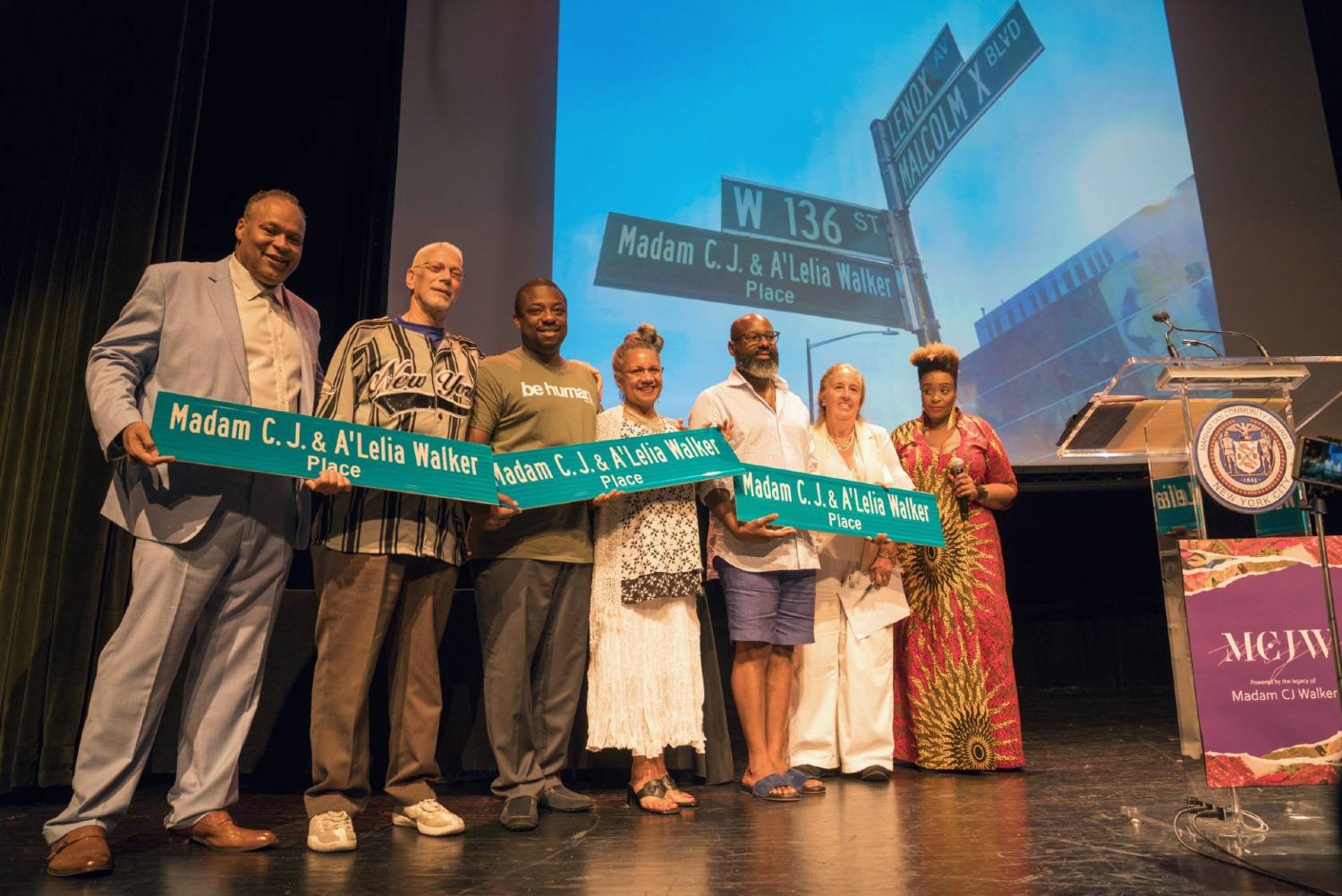 A'Lelia Bundles and others with signs for Madam C.J. & A'Lelia Walker Place