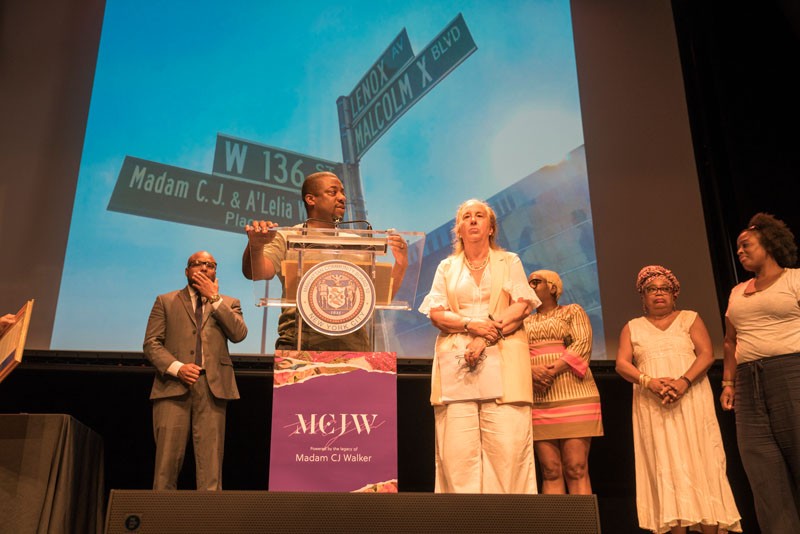 Photo Credit: Lynn Saville Speakers at podium