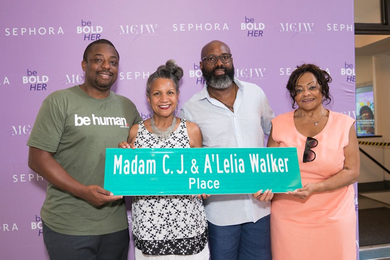 Group Photo with sign