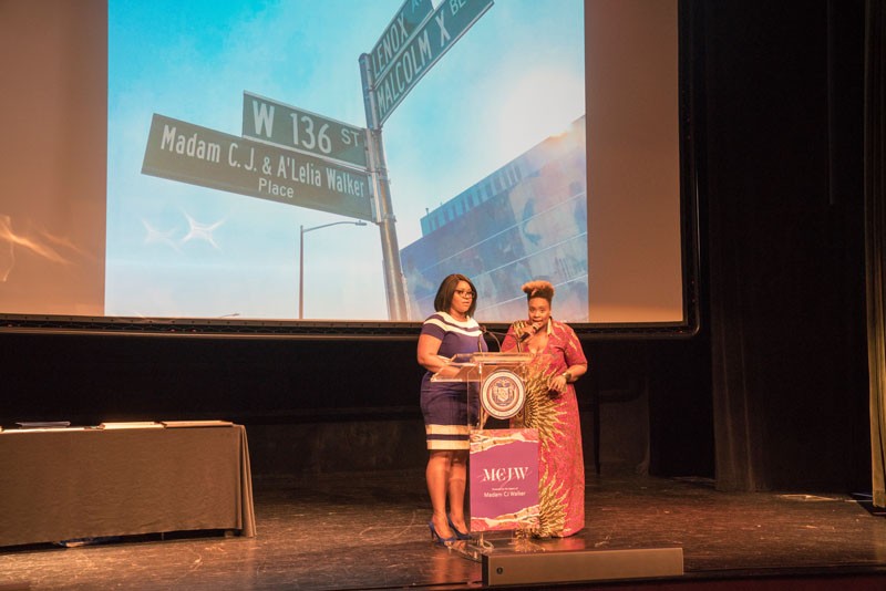 Photo Credit: Lynn Saville Speakers at podium