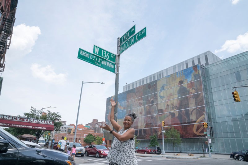 A'leila Bundles with street sign.