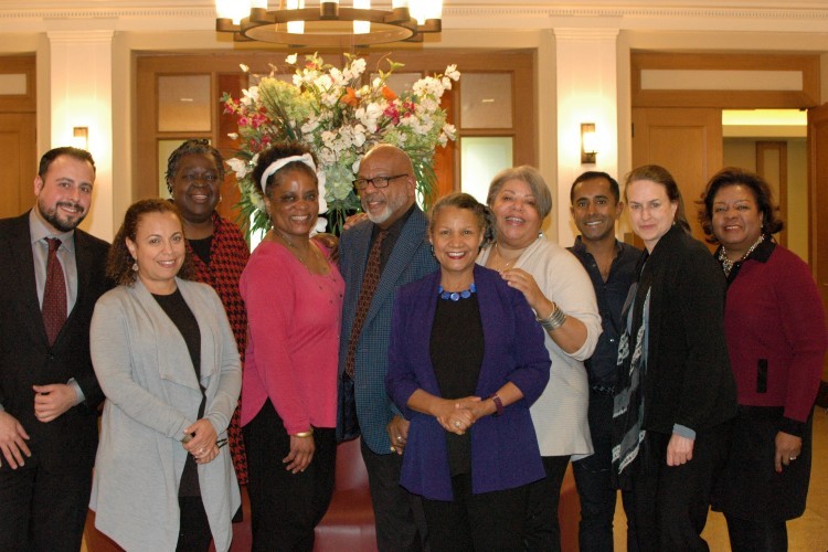 A group of A'Lelia Bundles Community Scholars and program staff with Bundles in the center.