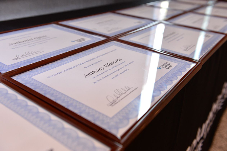 Graduates received diplomas for their work. Photo by Leslye Smith. Diplomas at the Columbia Business School graduation.