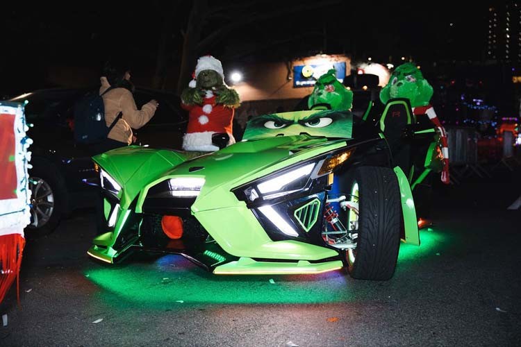 A grinch-decorated car in the Harlem Holiday Lights Parade.