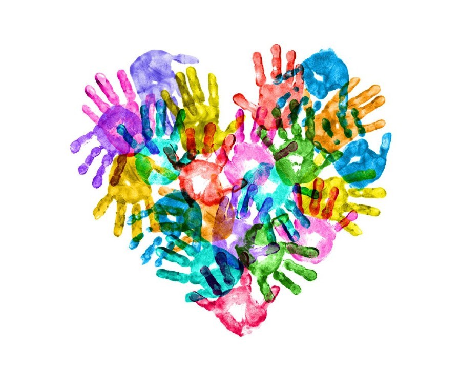 A heart made of handprints in different colors