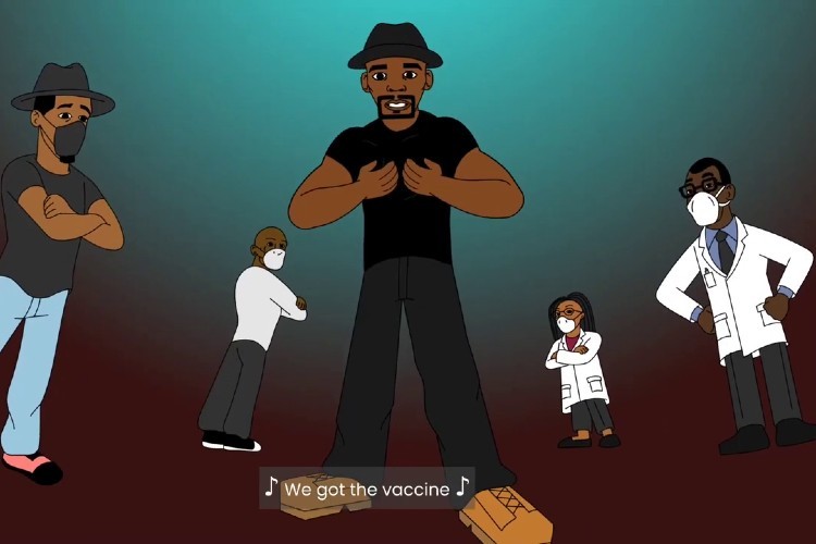 screenshot from video - animated characters with words we got the vaccine. 