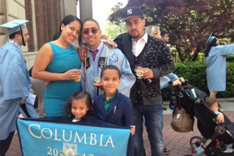 Jacob Serra at Columbia graduation with family. 
