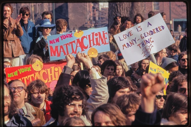 A photograph of a 1971 gay rights demonstration from the New York Public Library's photo archives. This photograph is one of many available for viewing this Pride month. A historical photo of a Pride march with a variety of signs.