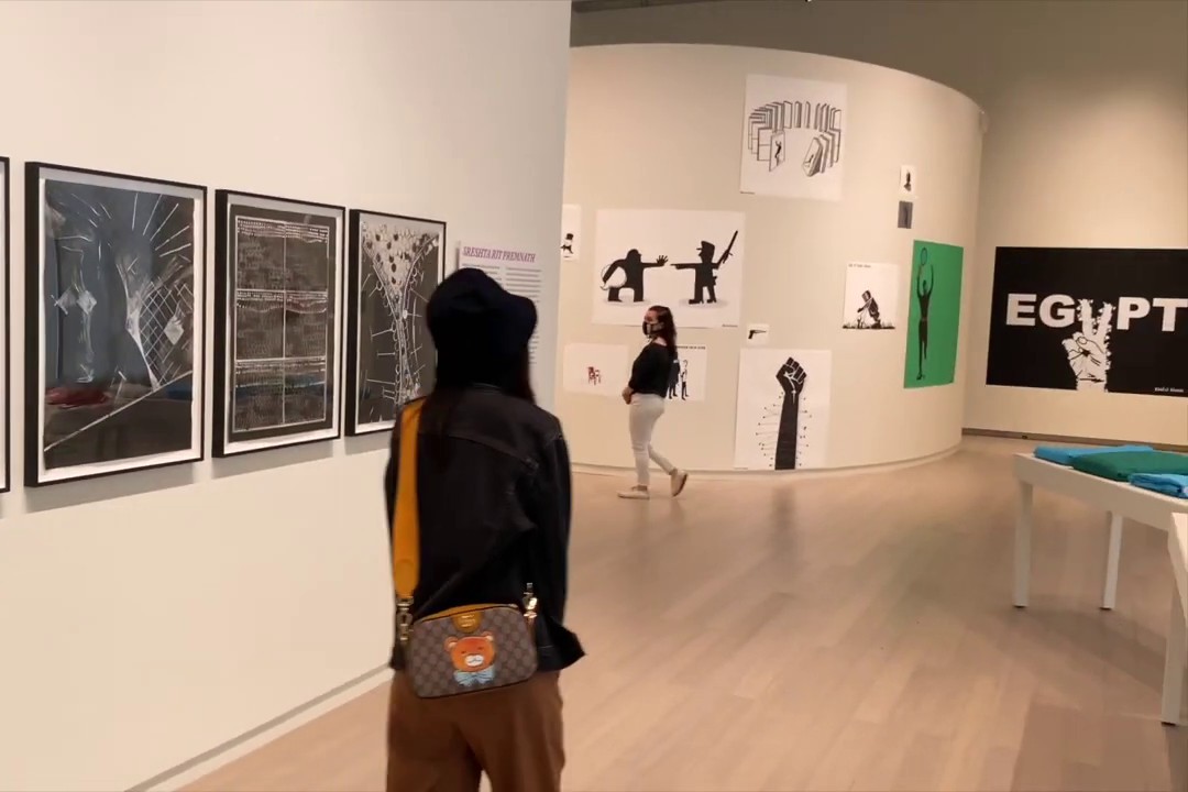 People walking in the gallery