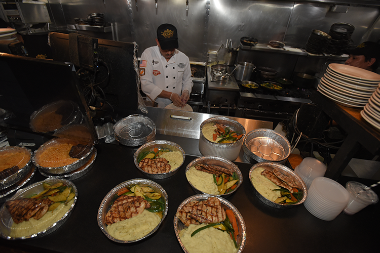 Delicious meals freshly prepared at Ricardo Steakhouse that were distributed to neighbors and community members as part of Columbia's "grab and go" project.. Image by Susan Farley. 