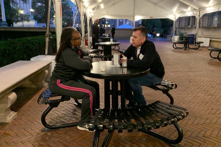 2 people sitting at a table