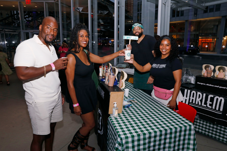 Beyond its burgers, Harlem Shake's milkshakes are a neighborhood staple. The eatery's co-owner DarDra Coaxum and her team shared them with attendees at Taste of Harlem 2025. Photo credit: Michael DiVito