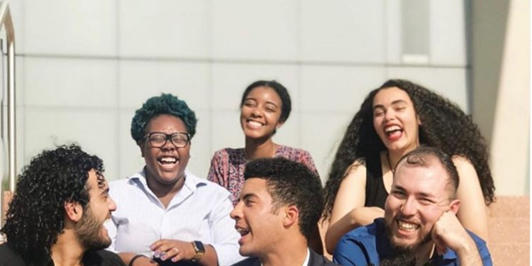 students outside talking
