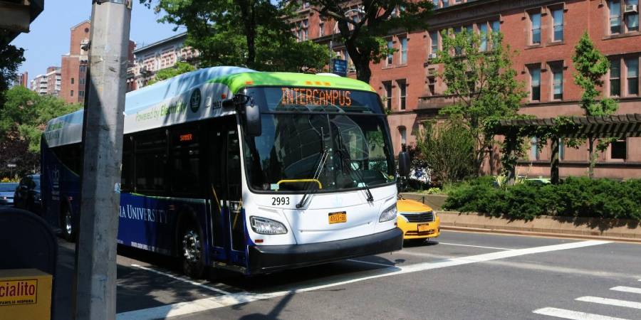 The Columbia Intercampus Shuttle stopped at an intersection. It is a bus, with an electric display at the front saying "Intercampus."