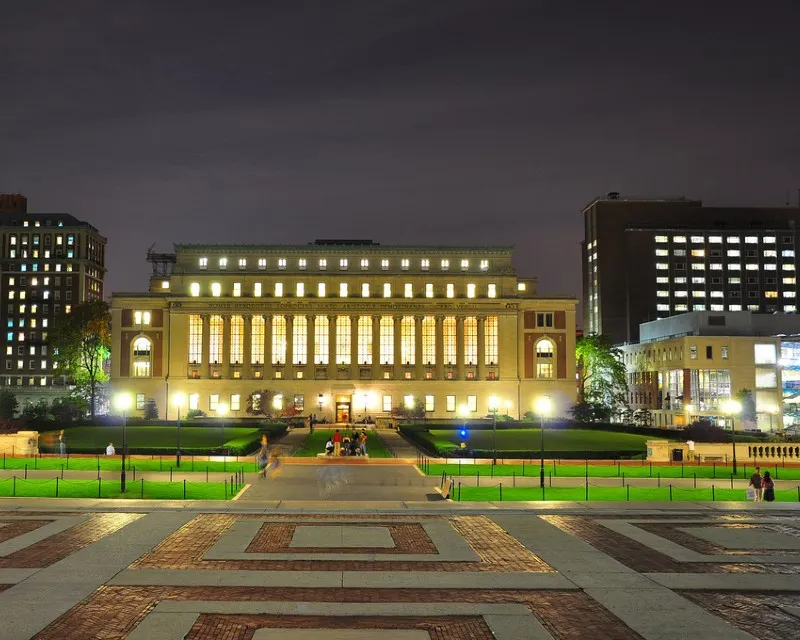 Exterior of Butler Library at night.