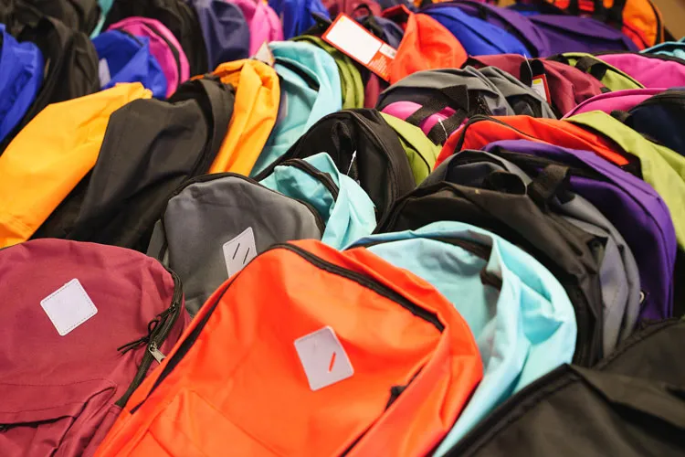 Row of backpacks.