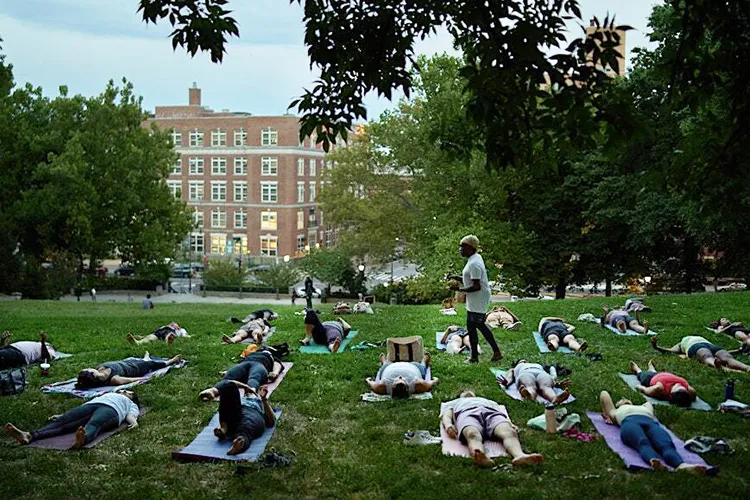 People doing yoga in Morningside Park.
