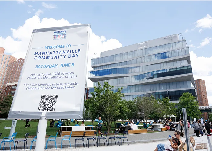 the manhattanville community day sign in front of the square