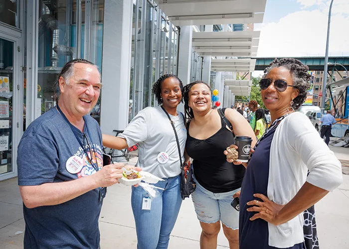 a group of people having fun at community day