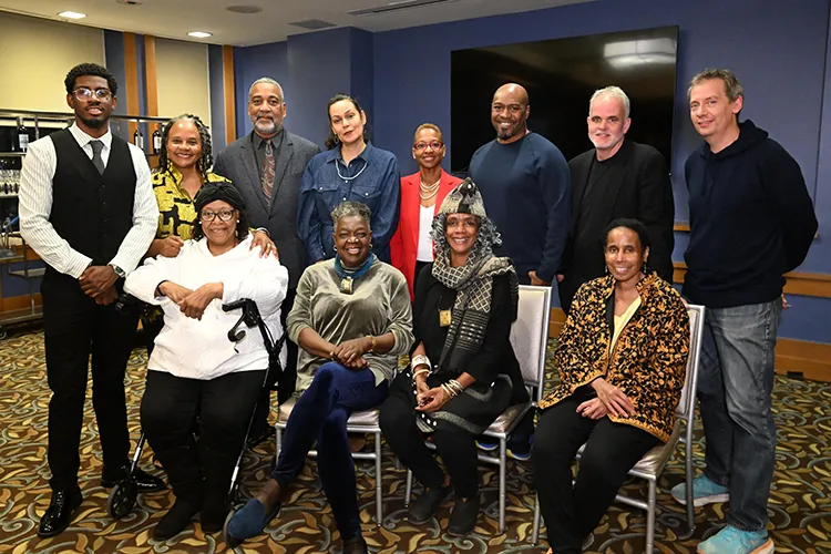Bundles Scholars from the current and previous cohorts gather for a photo. 