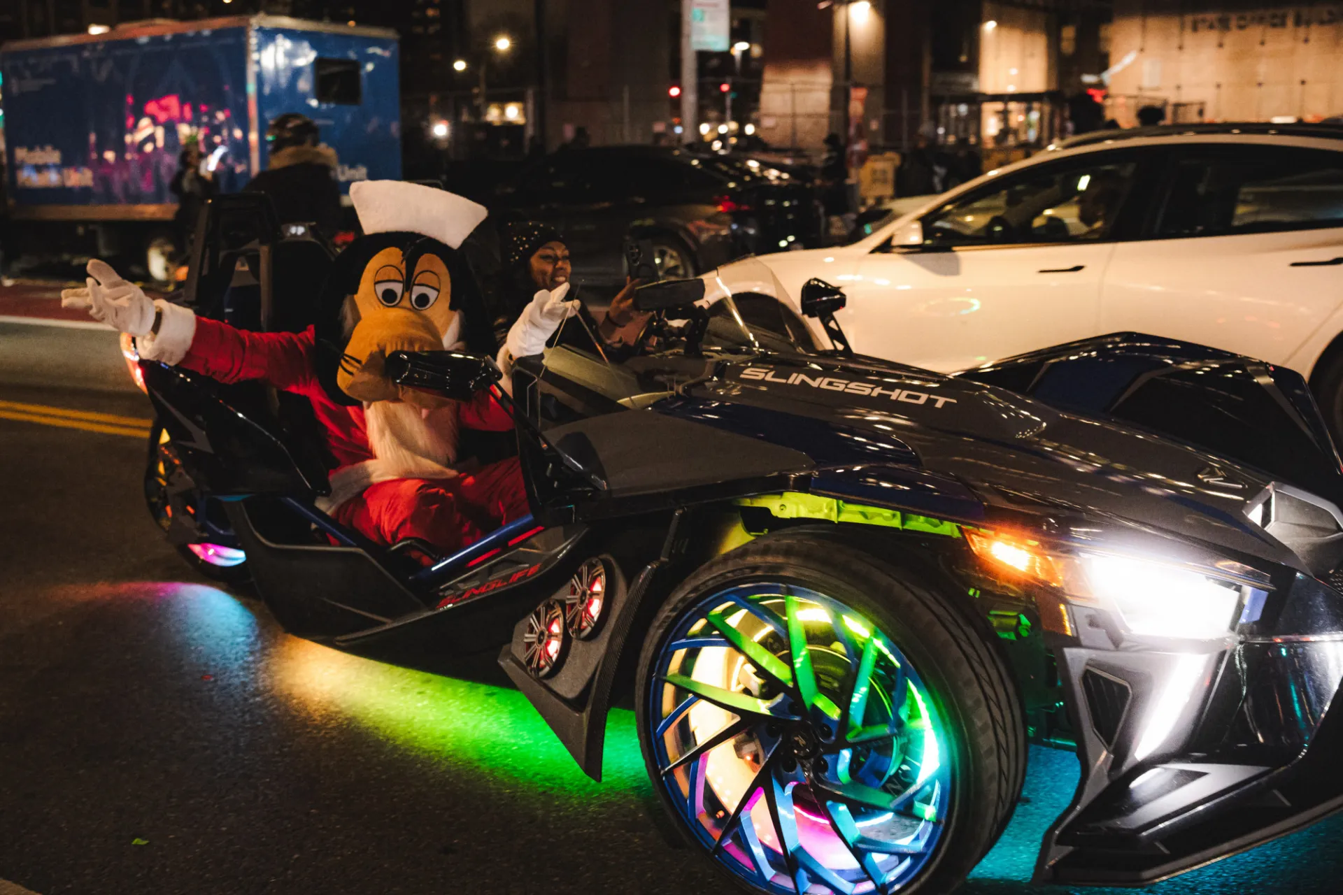 Harlem residents gather to check out the happenings during the Harlem Holiday Lights Parade. Photo credit: Brandon Vallejo
