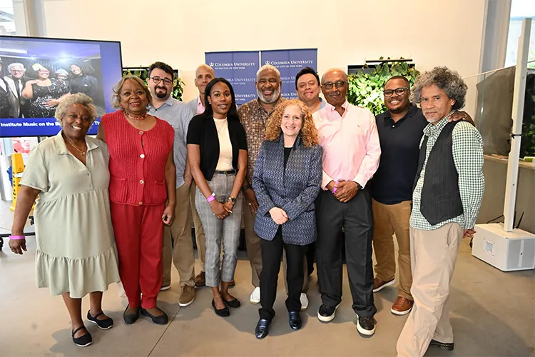 Victor Edwards and community leaders pose with Jennifer L. Mnookin pose at the community partners  breakfast.