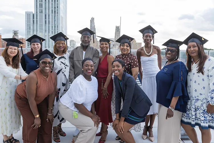 The July 30, 2026 graduation ceremony for the 21st cohort of InTOuCH program community health workers, including Program Coordinator Samantha Drummond and Nurse Educator Anne-Elie Etienne (center front). 