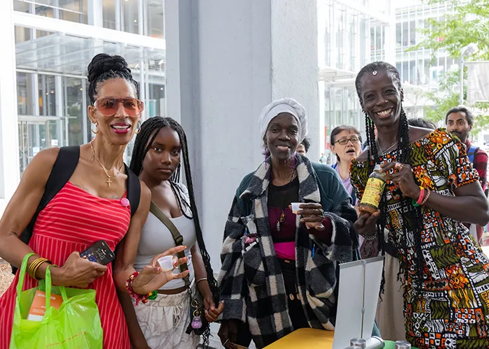 A group of women gather together at Manhattanville Community Day. 