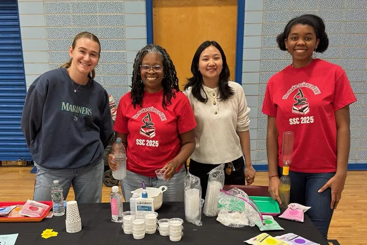 Stepanie Farmer (second from left) and her students tabling with Ms. Steph’s Science Club. 