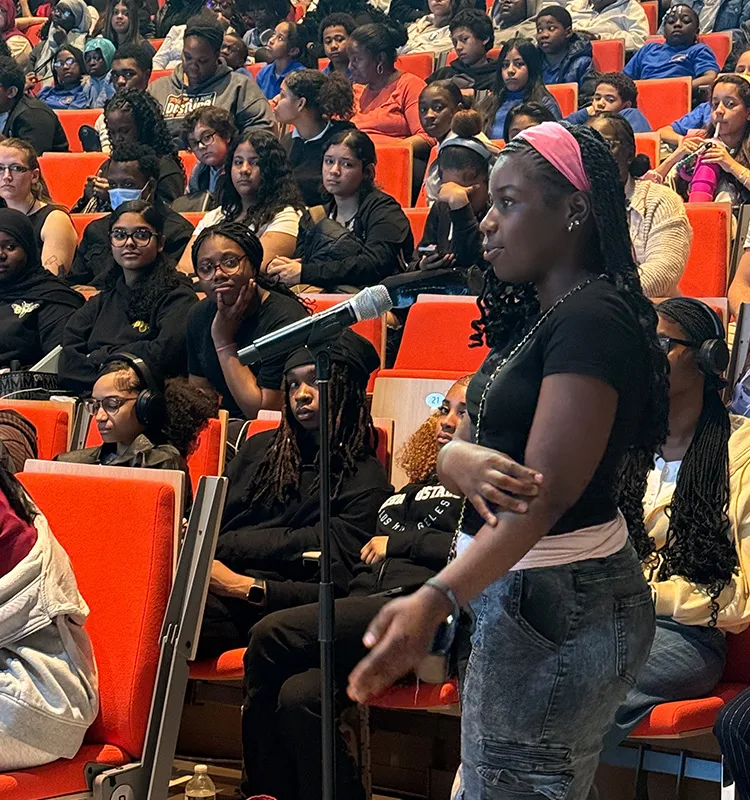 A student speaker asks a question at TCIONY’s “Weather or Not 2.0” event. 