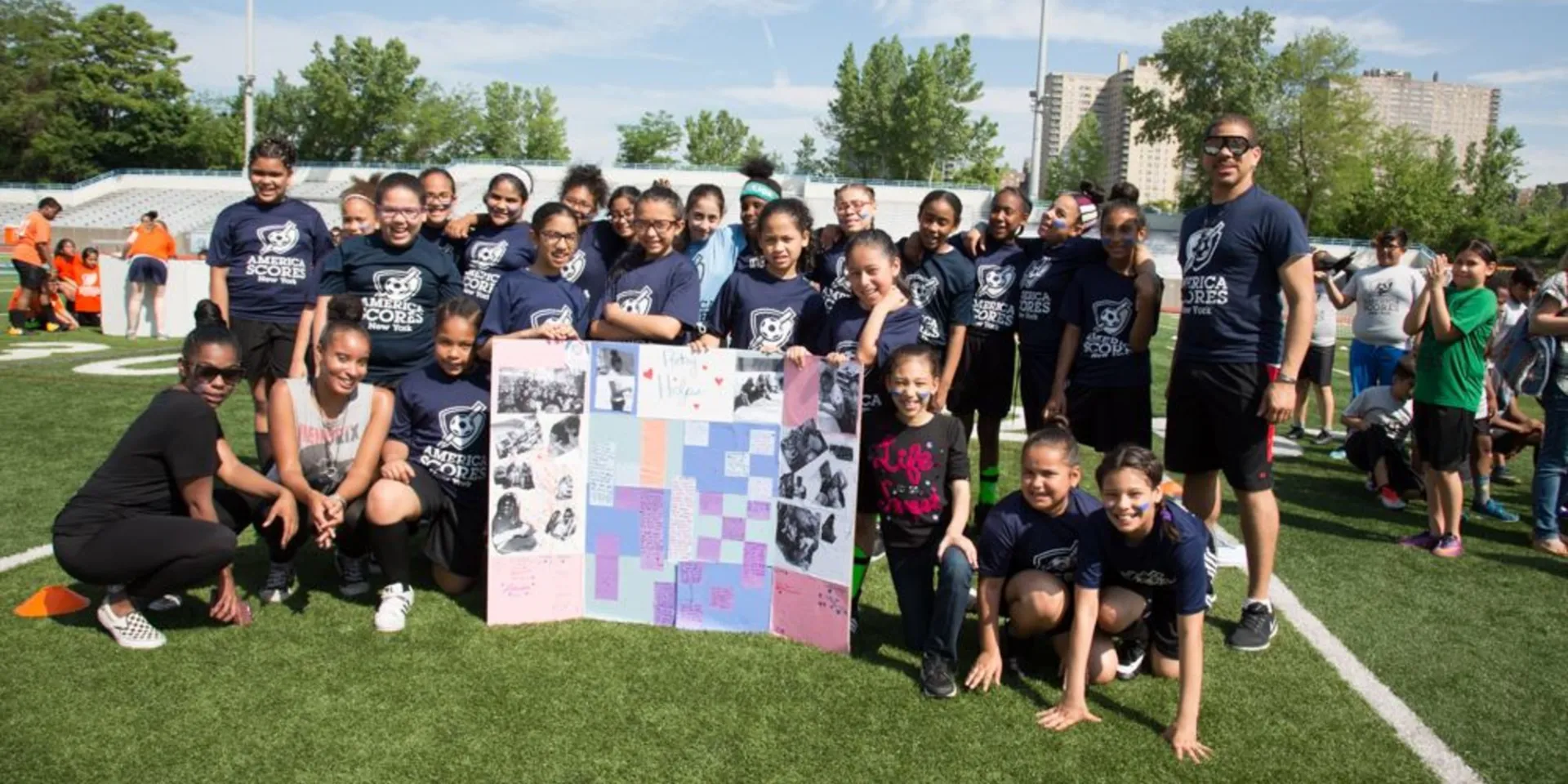 Students pose for a picture at Columbia Baker Field Athletic Complex