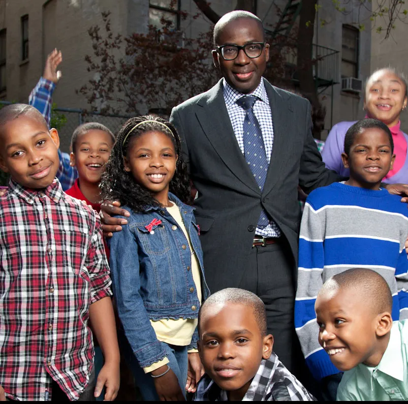Olajide Williams, MD (center)