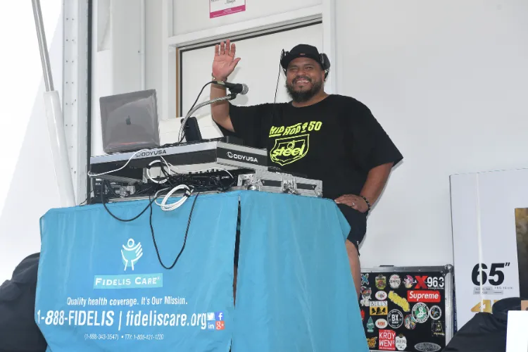Upbeat music spun by a local DJ kept the celebratory vibes going at the back-to-school block party. Photo credit: Susan Farley