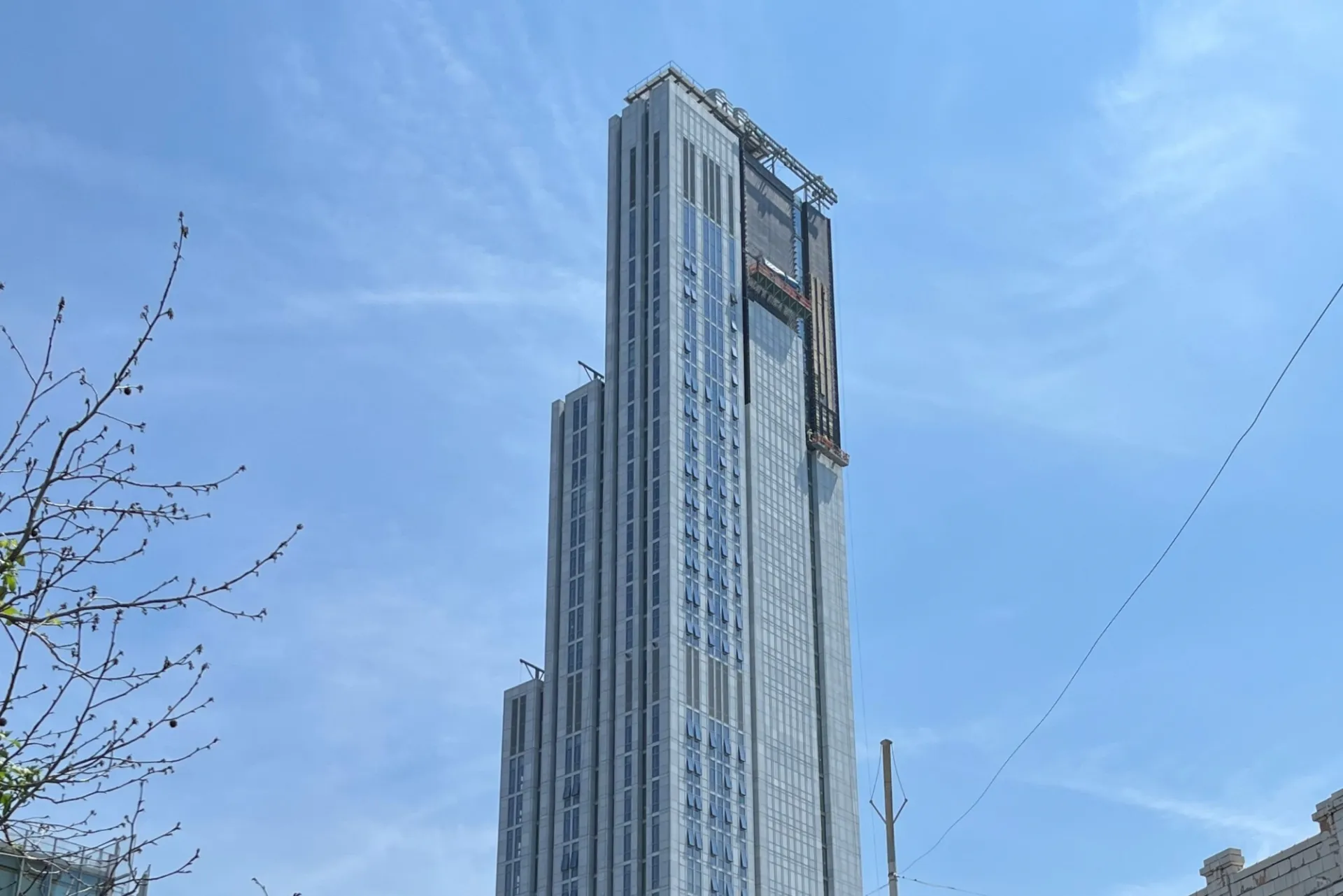 A view of the top floors of 600 W. 125th Street on a sunny day.