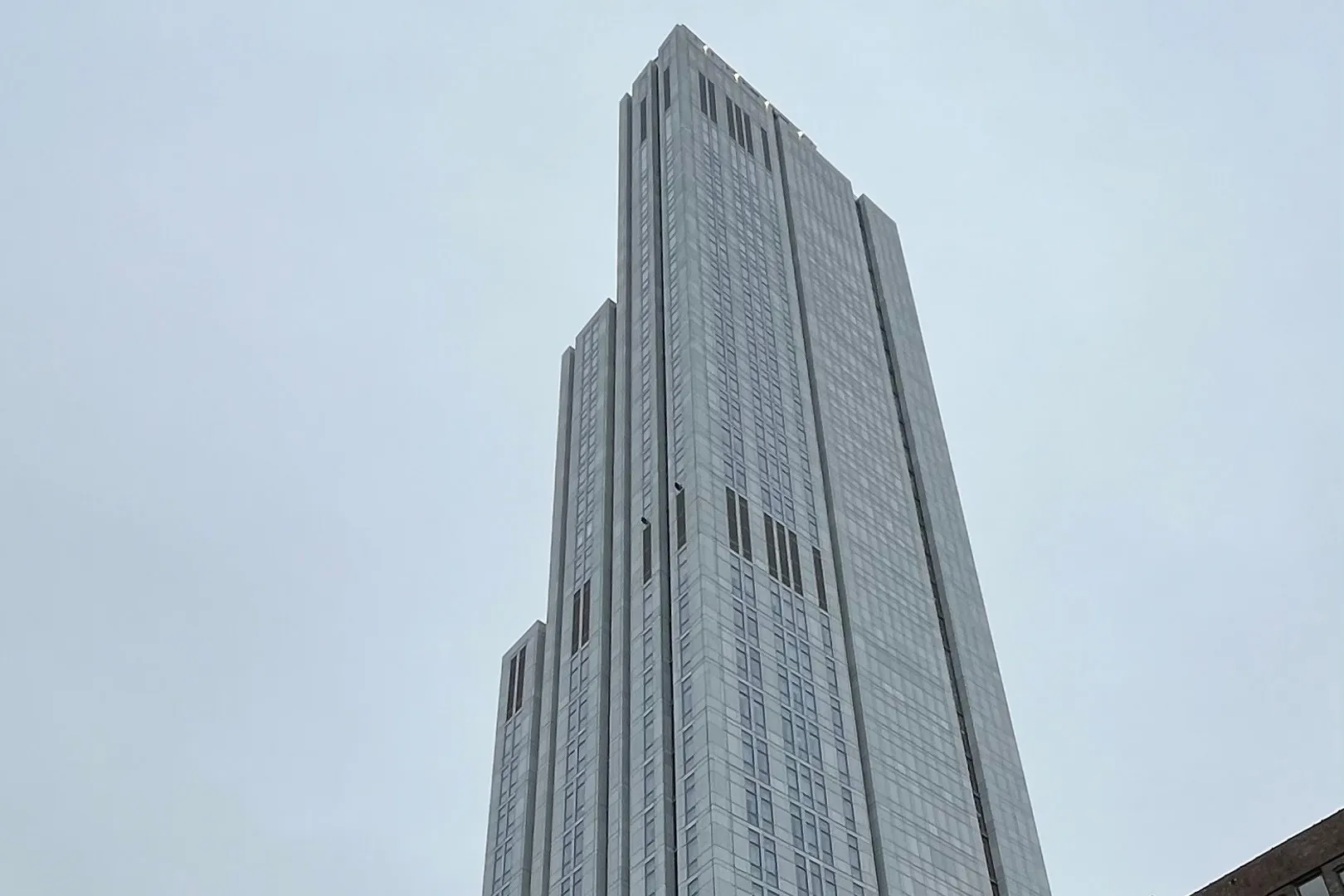 A view of the upper floors of 600 W. 125th Street on a cloudy day.