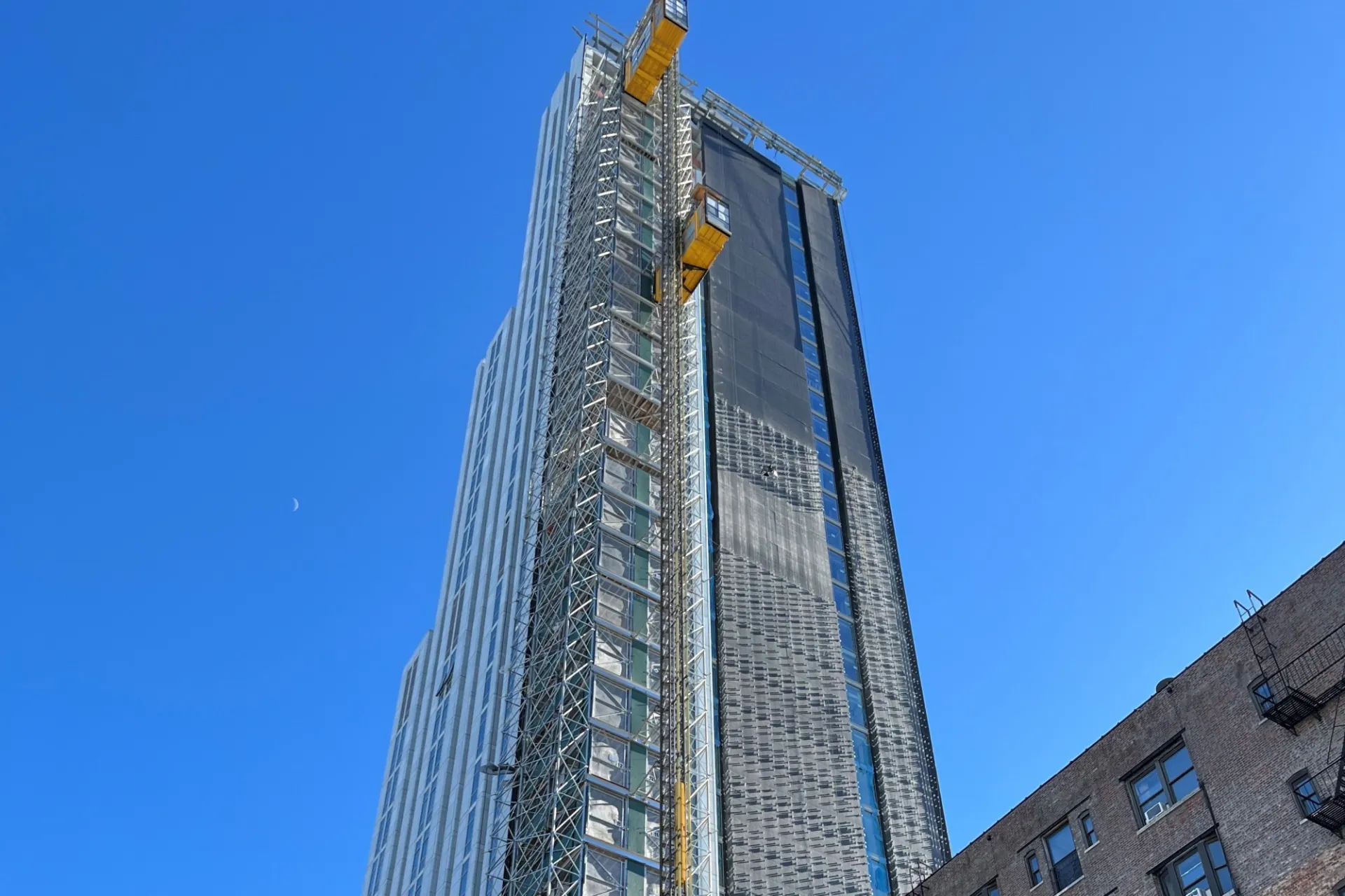A view of 600 W. 125th Street, looking southeast, on a sunny day.