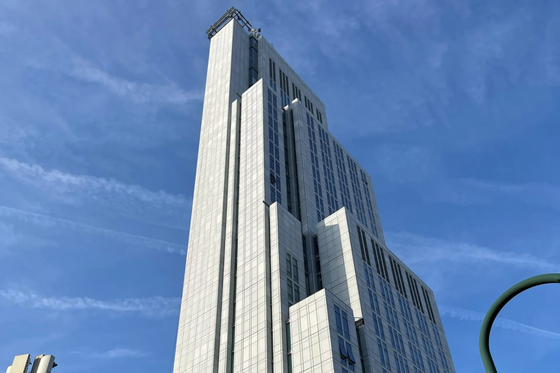 A view of the upper floors of 600 W. 125th Street looking up to the sky.