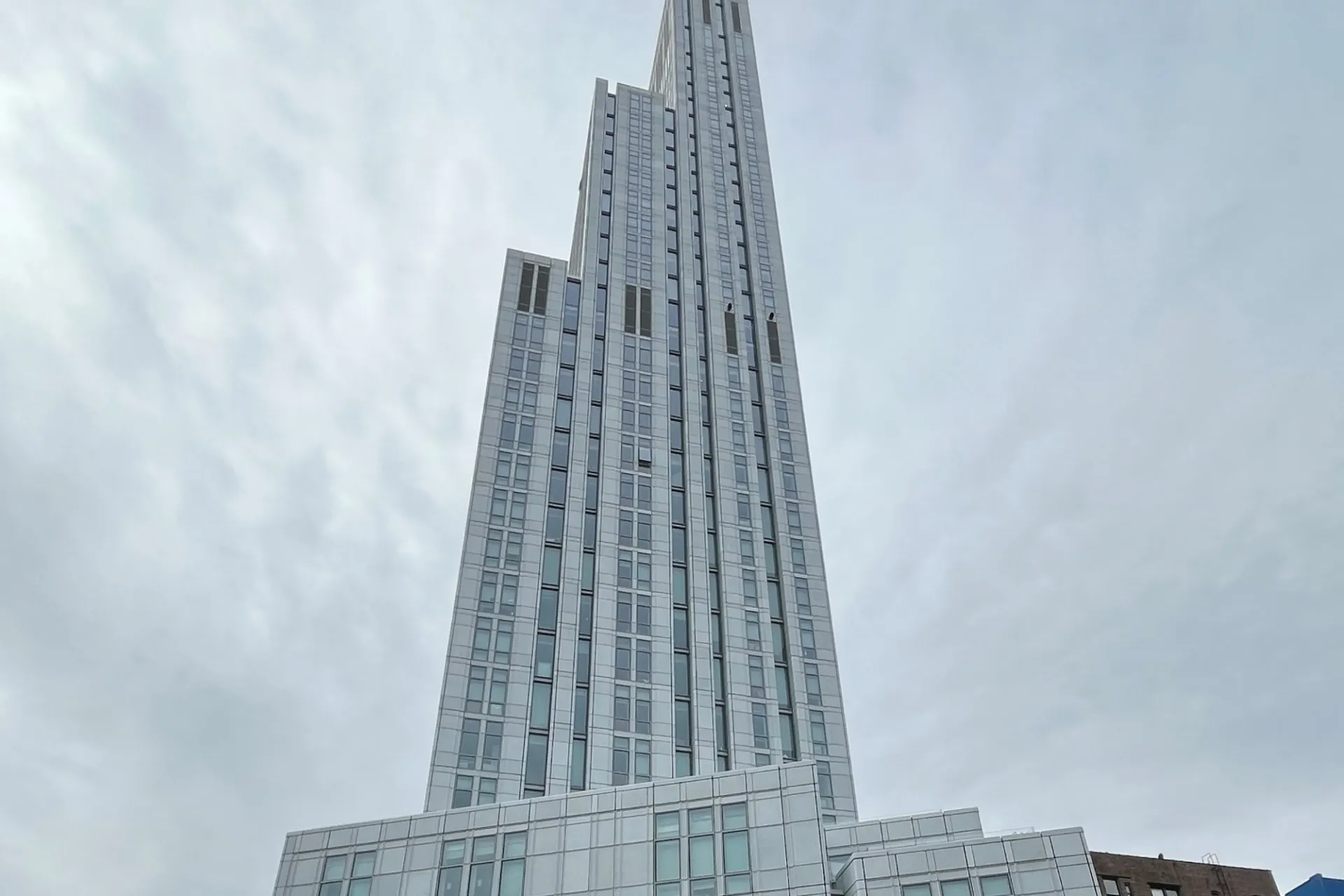 A view of the upper floors of 600 W. 125th Street on a cloudy day.