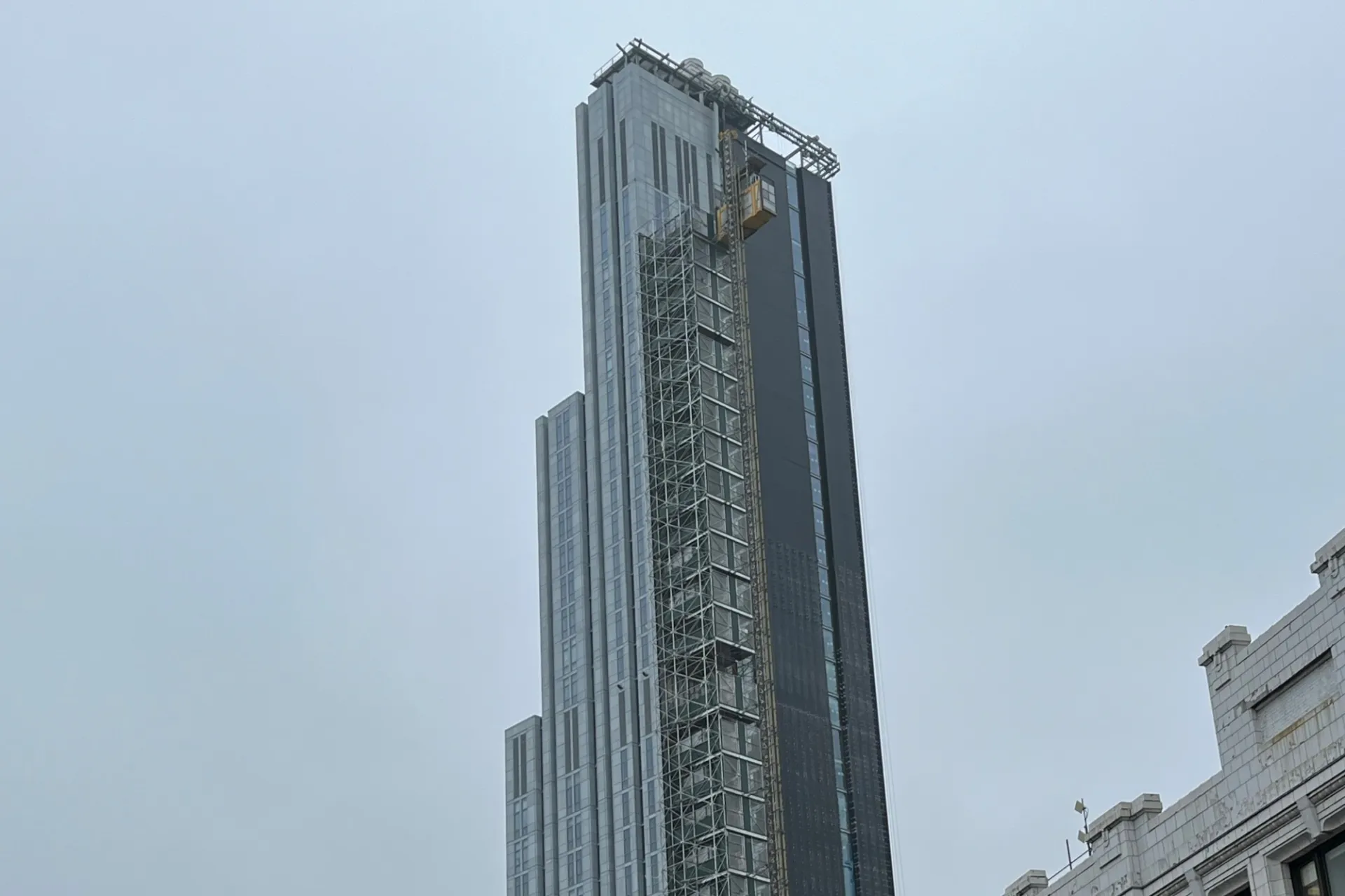 A view of the upper floors of 600 W. 125th Street looking up to the sky. 