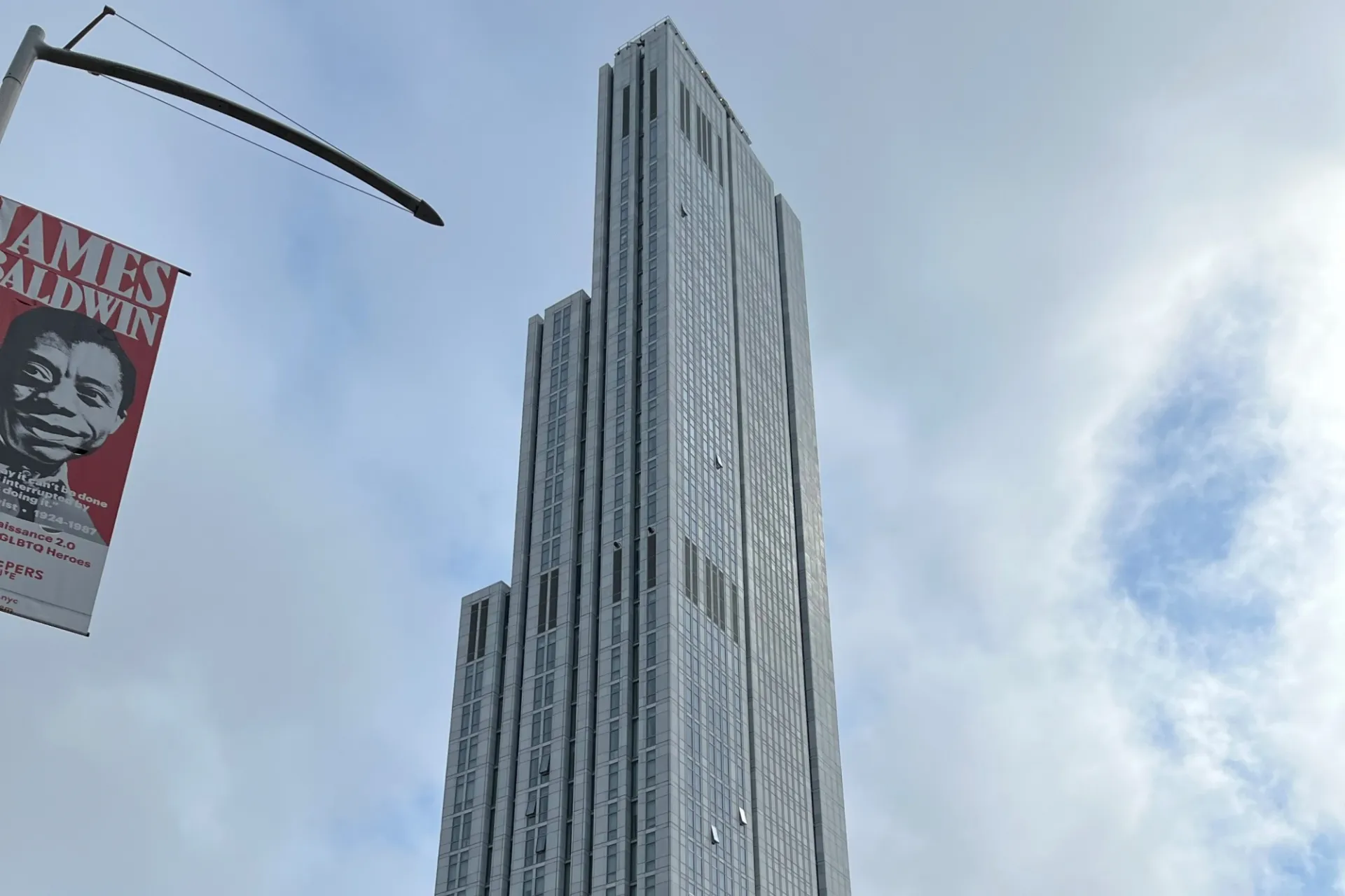 A view of the upper floors of 600 W. 125th Street on a cloudy day. 