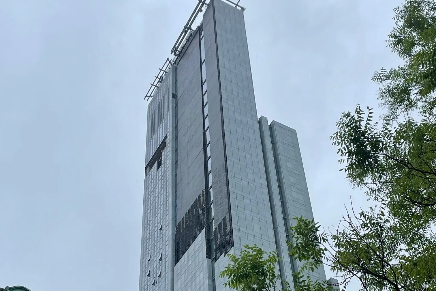 A view of the upper floors of 600 W. 125th Street on an overcast day.