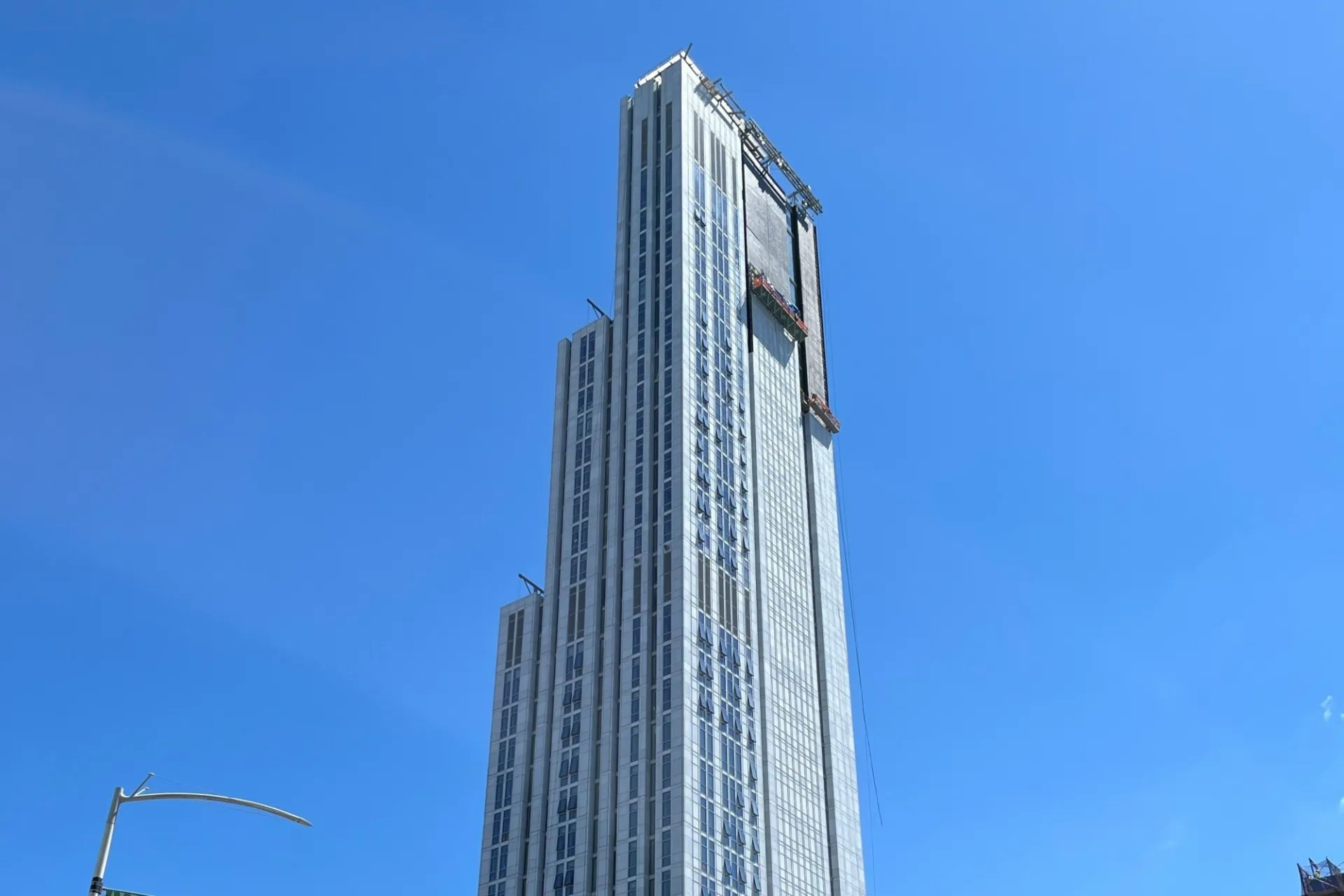 A view of the top floors of 600 W. 125th Street on a sunny day.