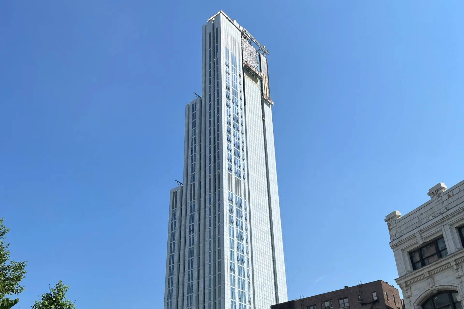 A view of the top floors of 600 W. 125th Street on a sunny day. 