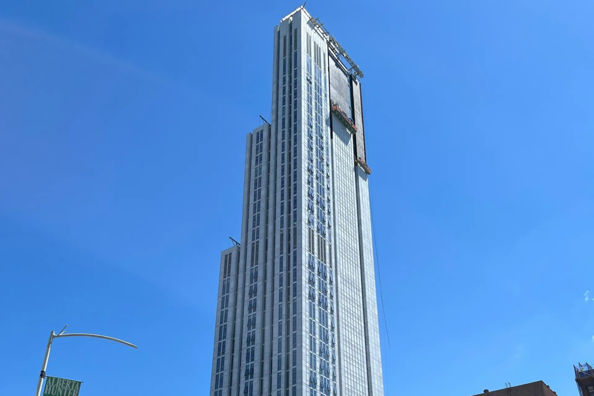 A view of the upper floors of 600 W. 125th Street on a sunny day.