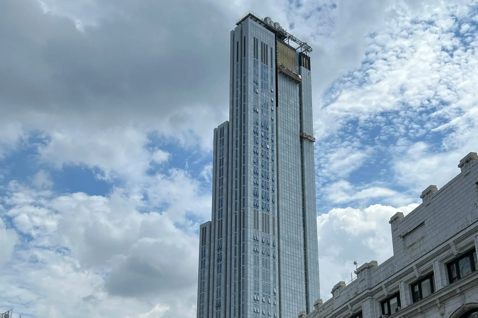 A view of the upper floors of 600 W. 125th Street on a cloudy day.