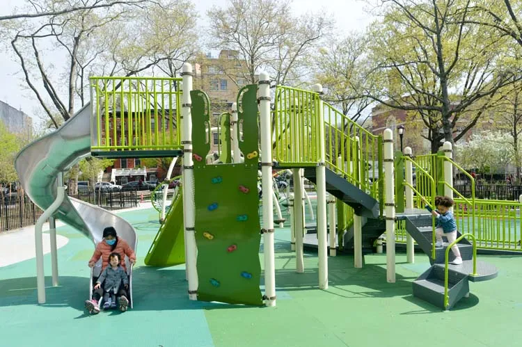 Man and child on slide