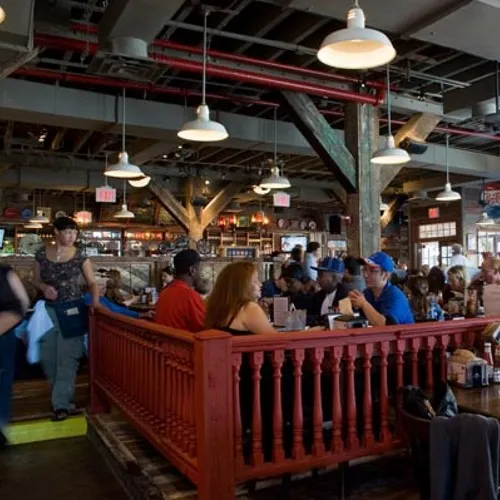 Dining inside Dinosaur BBQ in West Harlem, on 125th Street.
