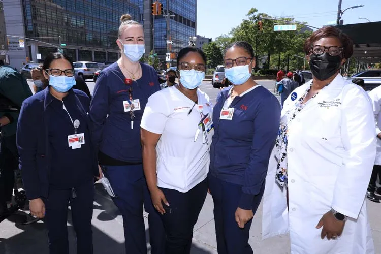 group of medical professionals standing for a photo