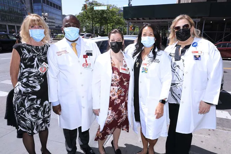 group of medical professionals standing for a photo