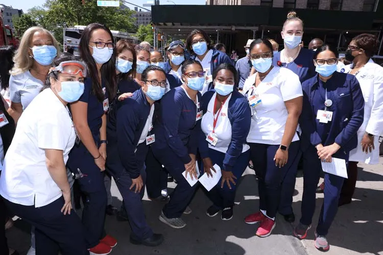 group of medical professionals standing for a photo